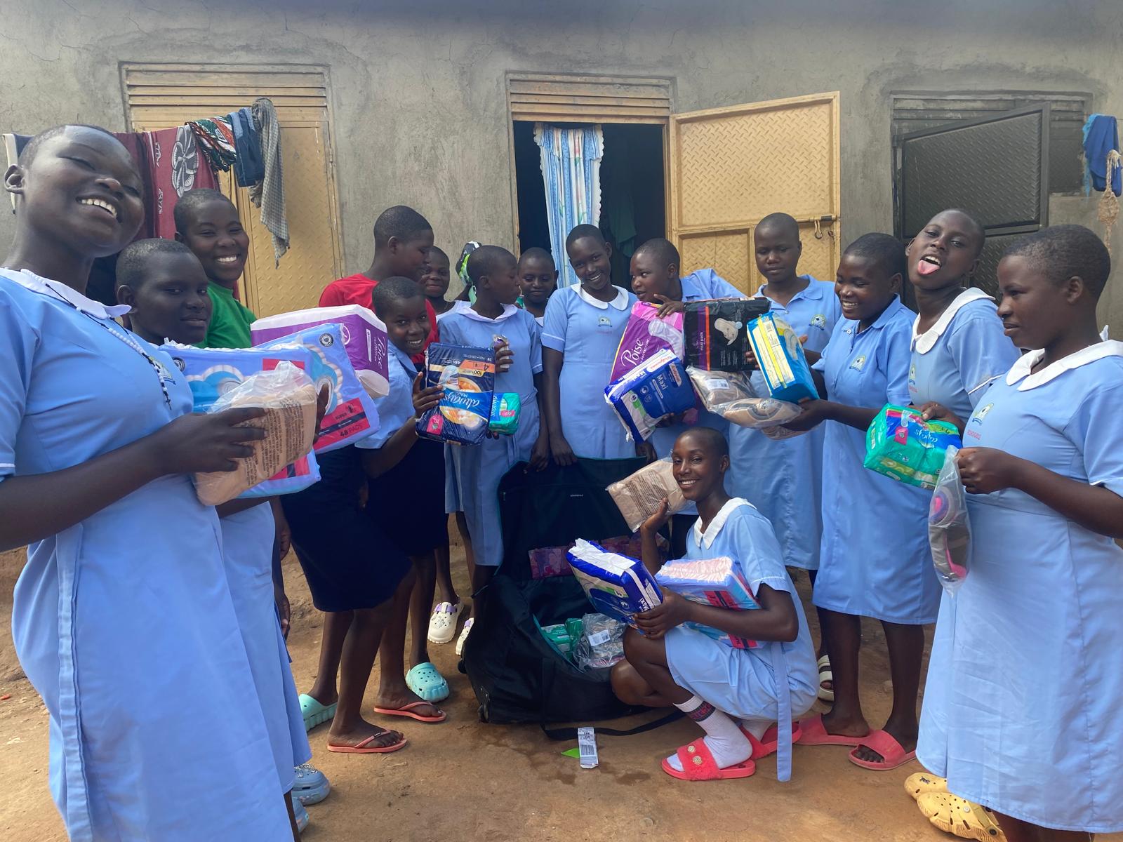 Two young students in orange uniforms